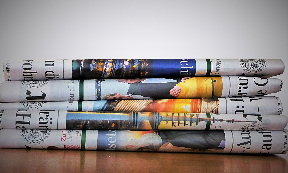 NEWSPAPER ADVERTISING